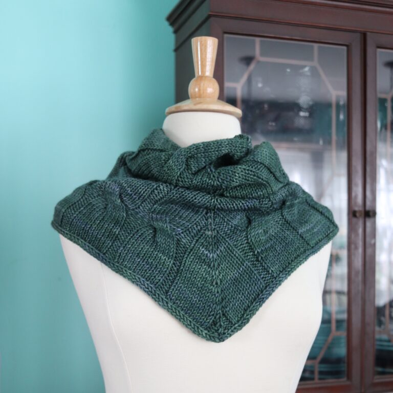 a handknit cabled cowl